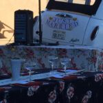 Wedding table with London Taxi cab in the background.